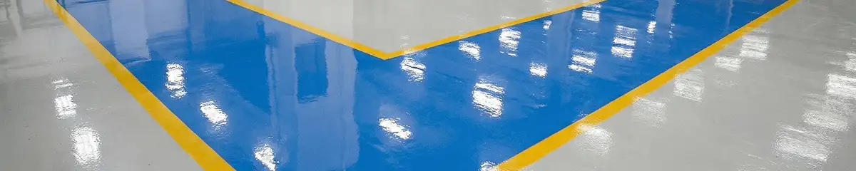 A factory floor professionally covered and marked with epoxy flooring in Sacramento, CA