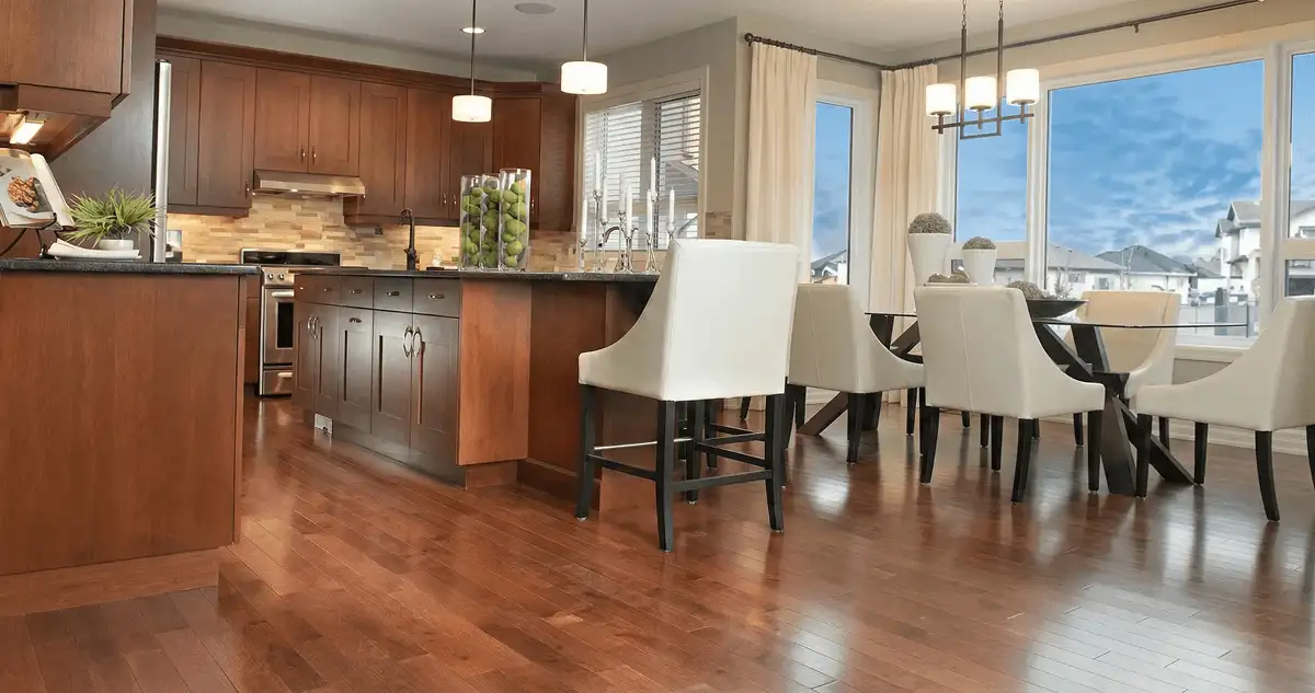 A modern kitchen with professionally installed wood flooring in Sacramento, CA