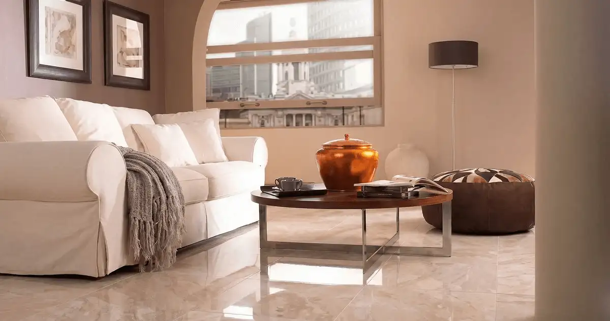 Modern living room with professionally installed marble flooring, a beige sofa, coffee table in Sacramento, CA