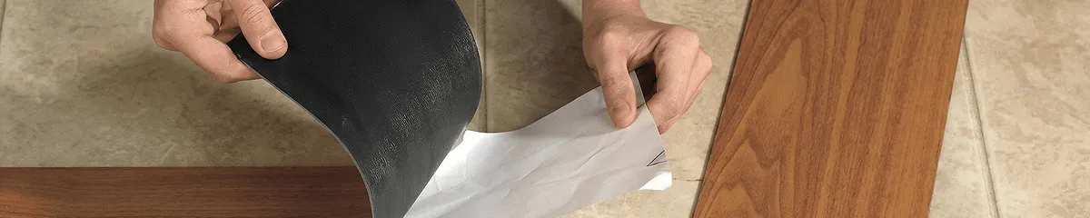 A professional installing vinyl flooring in Sacramento, CA